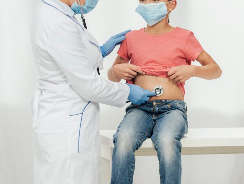 doctor-checking-girl-with-mask
